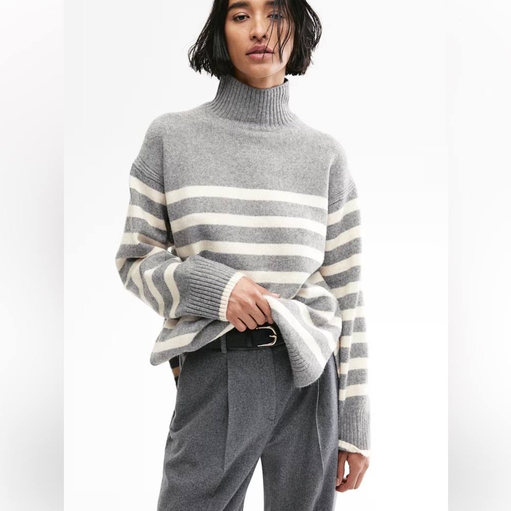 H & M oversized striped sweater. Has a super cute v detailed on the neck. Large.